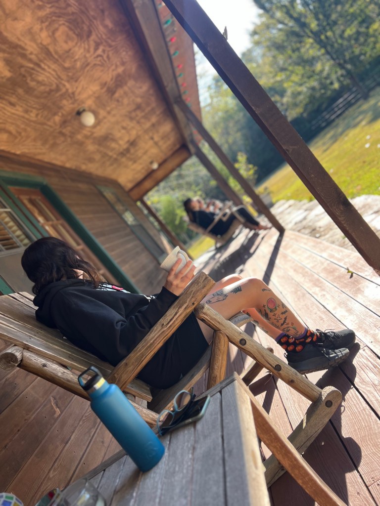 Woman sitting on a front porch